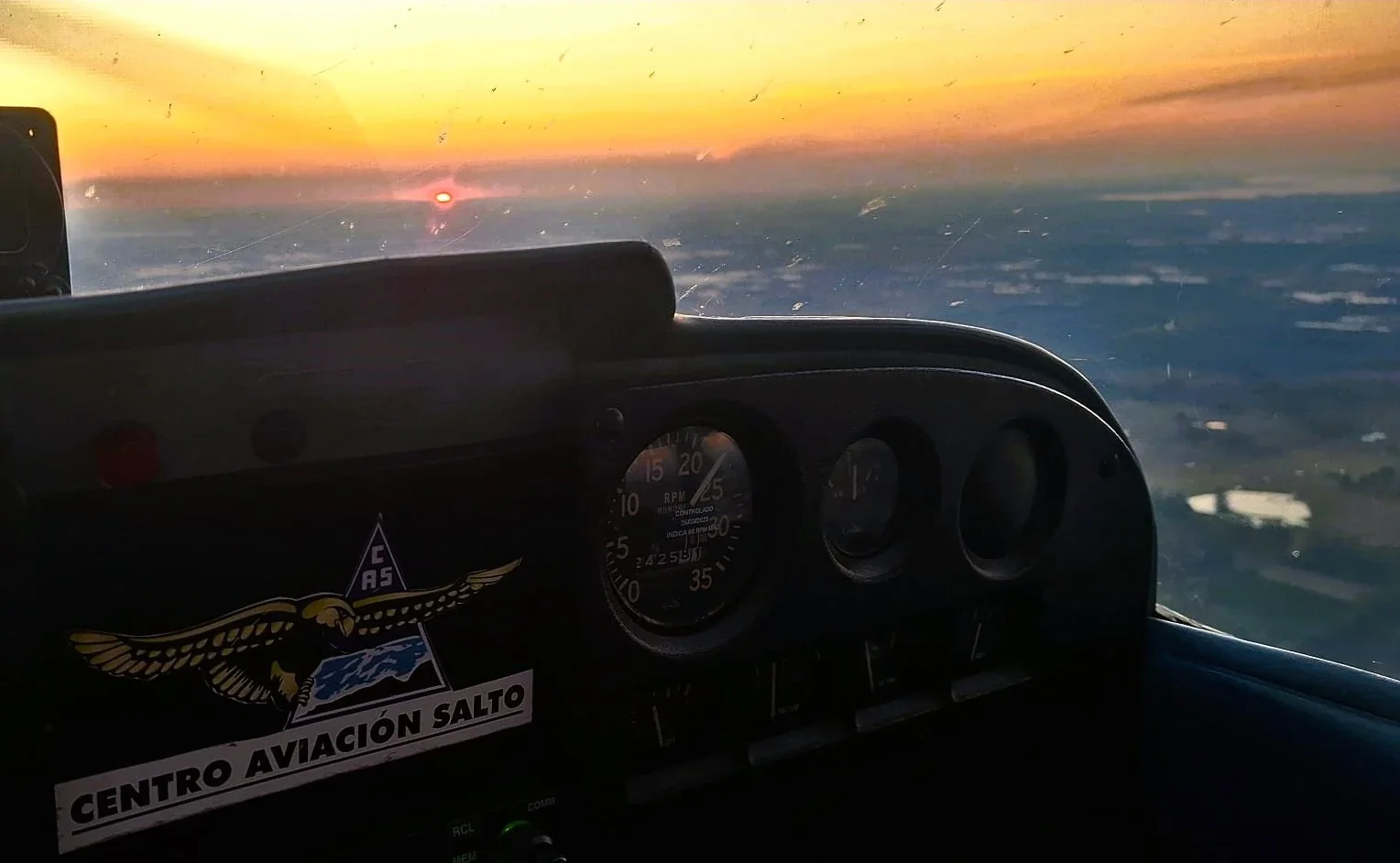 Scenic flight over Salto and Dayman - Sunset cockpit view, Centro Aviacion Salto, Uruguay