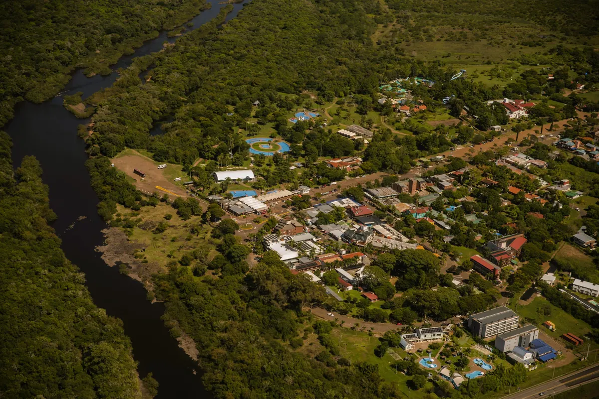 Aerial view of Termas del Dayman spa town, its thermal pools and the Dayman river near Salto, Uruguay