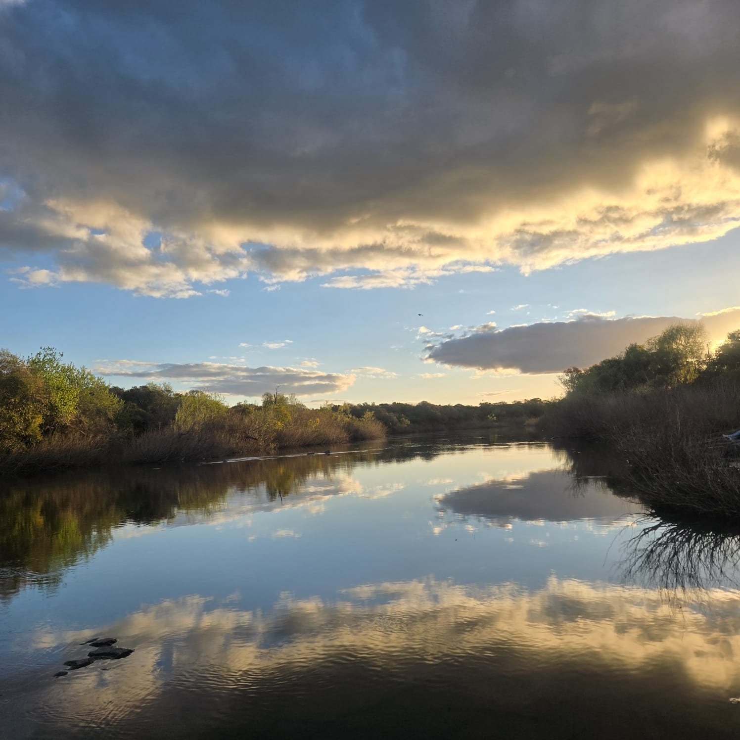 Evening cloudscape over the Río Daymán at Termas del Daymán, Salto, Uruguay