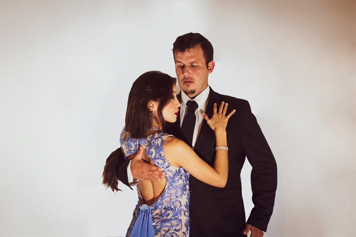 Tango in Salto, Uruguay - studio portrait of a tango couple in evening dress and black tie